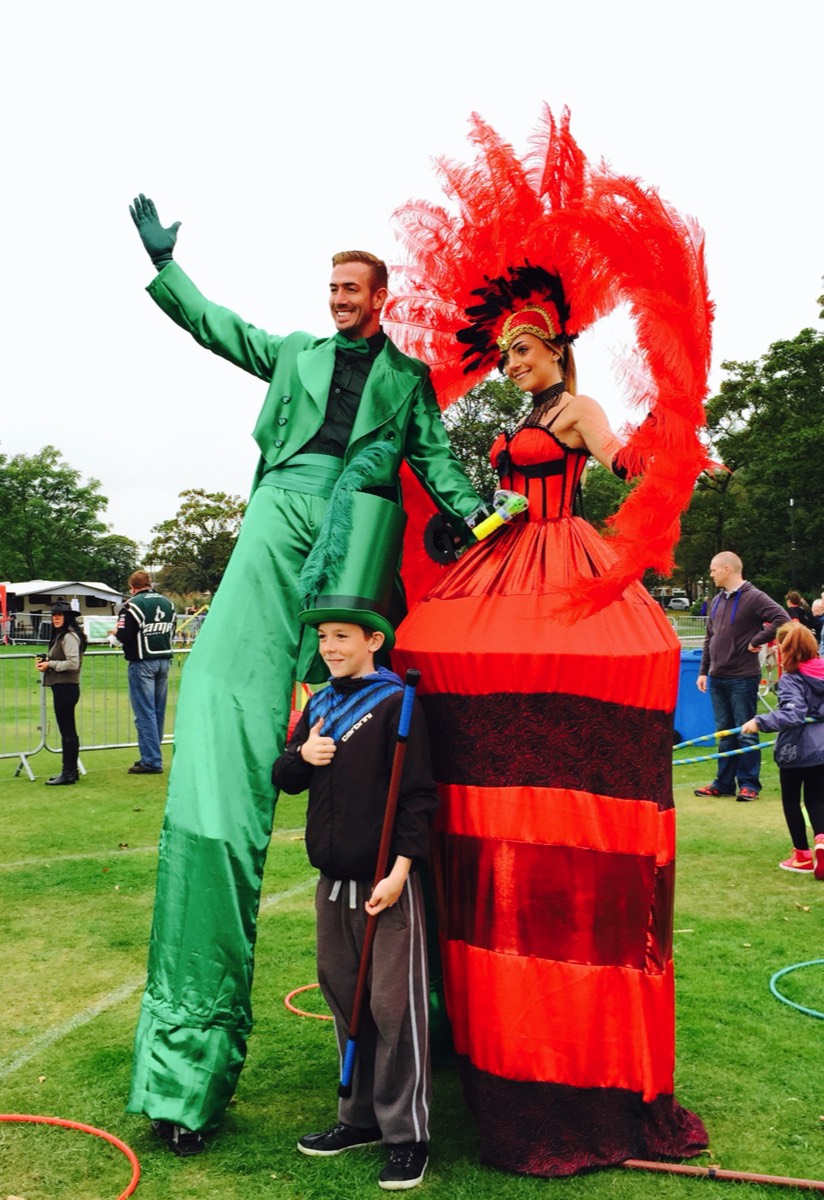 Two Stiltwalkers performing walkabout entertainment