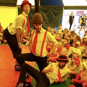 The Brothers Sensible performing their show in a school