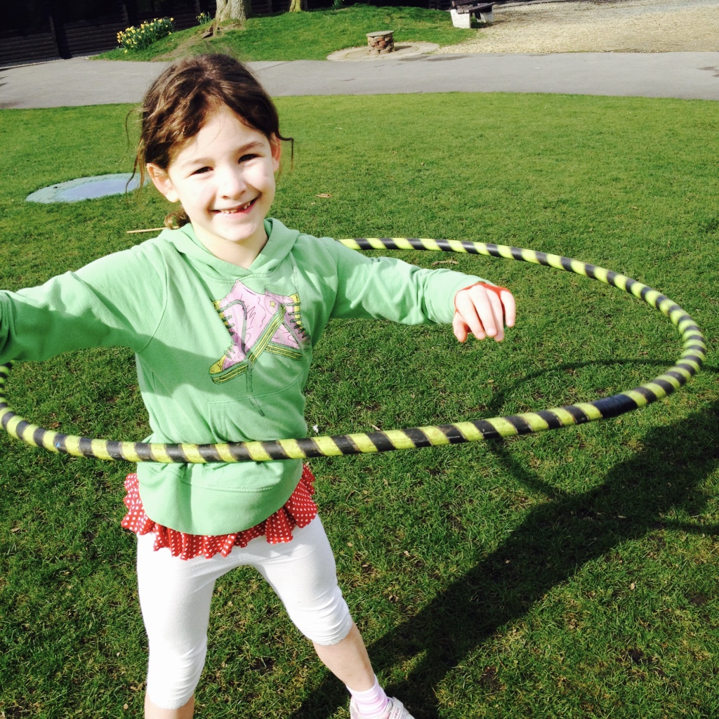 Learning to Hula Hoop at a School Fair