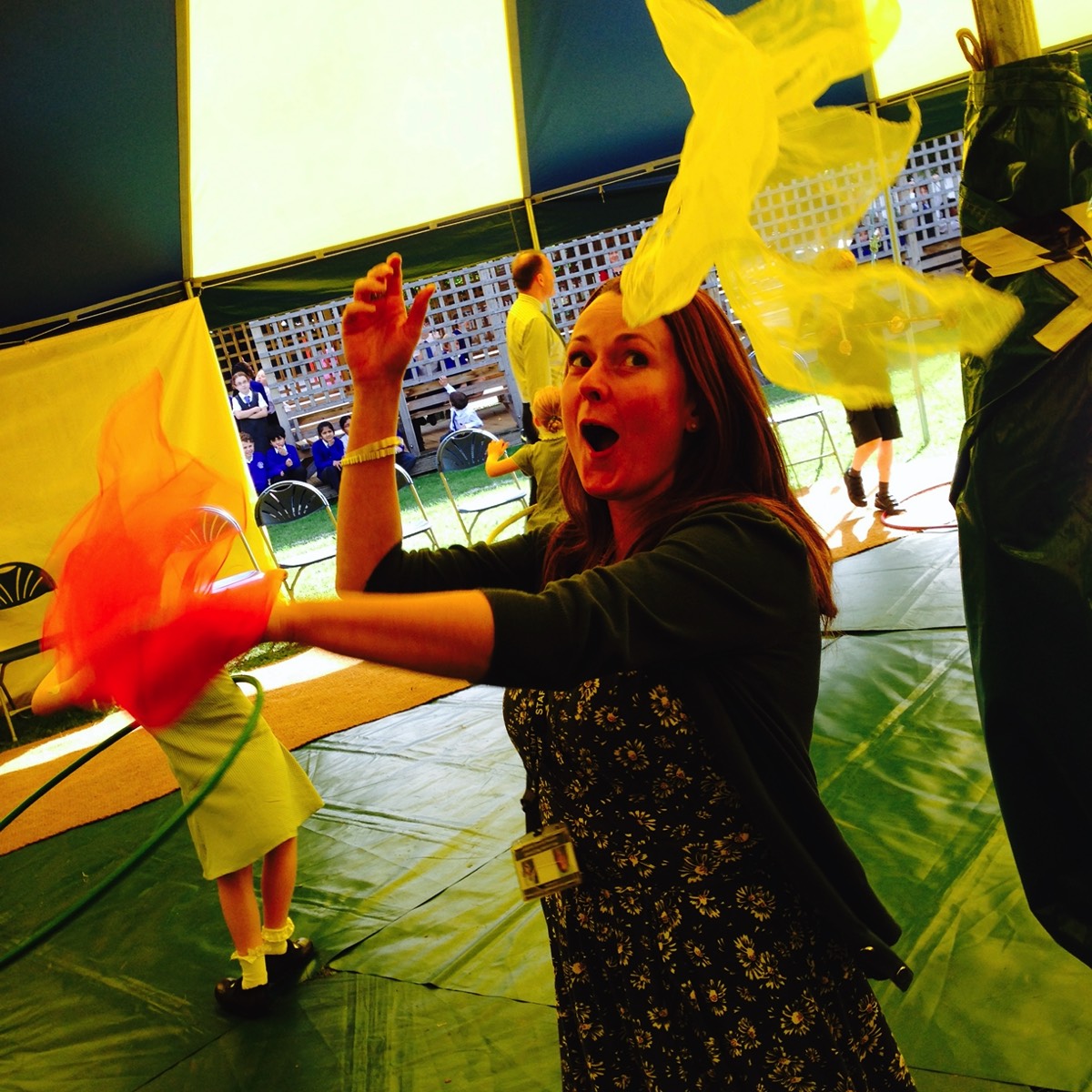 A teacher learning to Juggle scarves at one of our Circus Skills Workshops